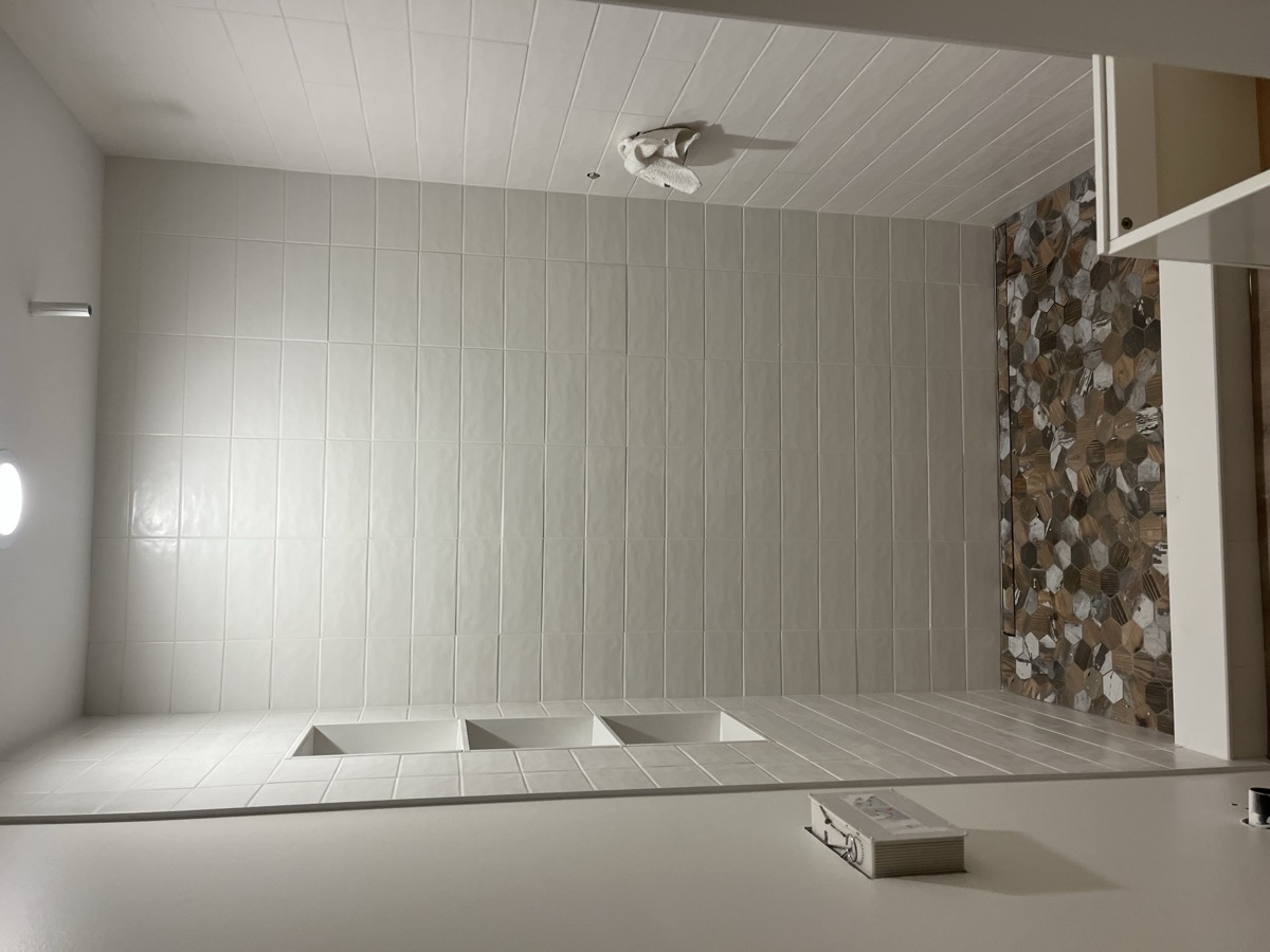 Bathroom with decorative accent tile wall in Charlotte NC