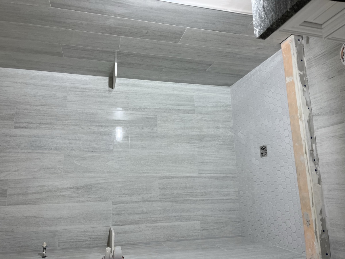 Gray shower tile installation in Charlotte NC